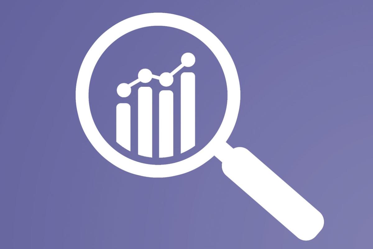 Magnifying glass over a bar chart