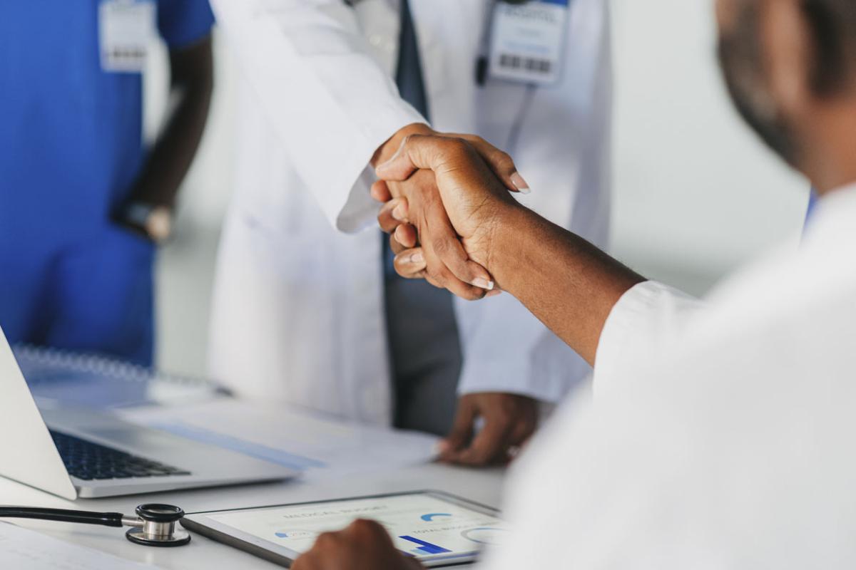 Two people shaking hands